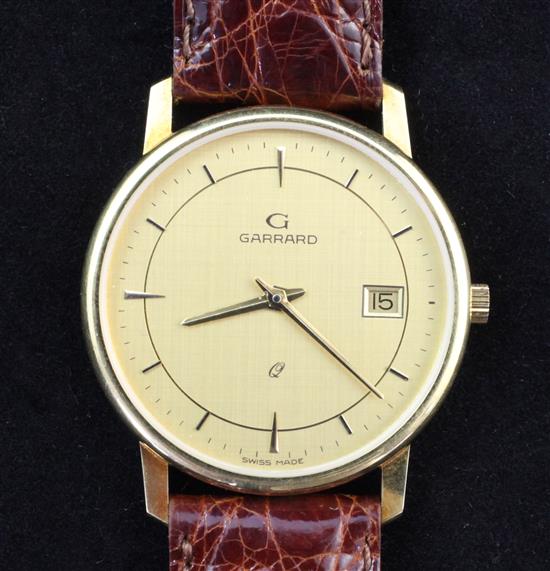 A gentlemans 1990s 18ct gold Garrard quartz dress wrist watch,